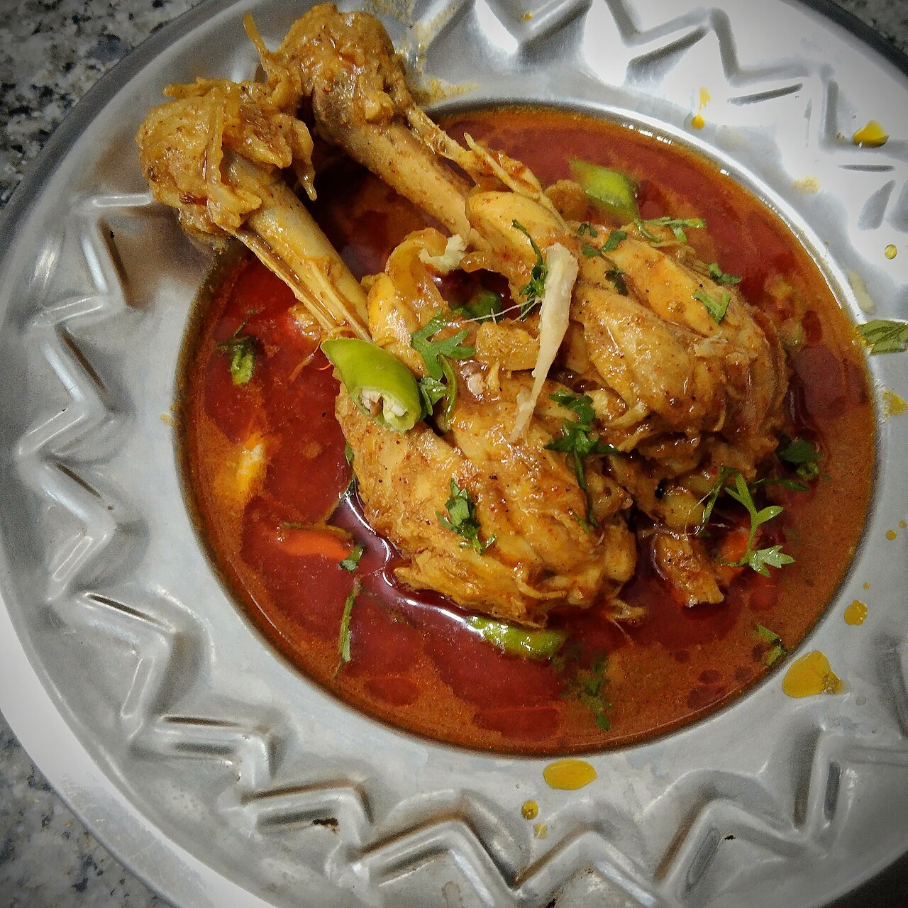 Lamb Shank Curry at Afghan Natural — slow-cooked lamb