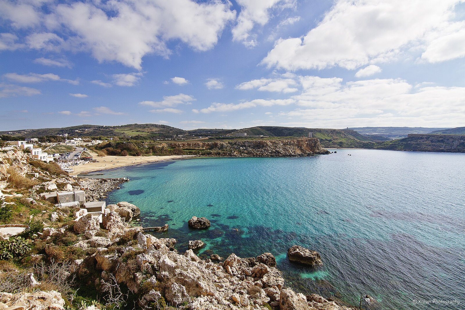 Golden Bay sandy beach at sunset, Malta